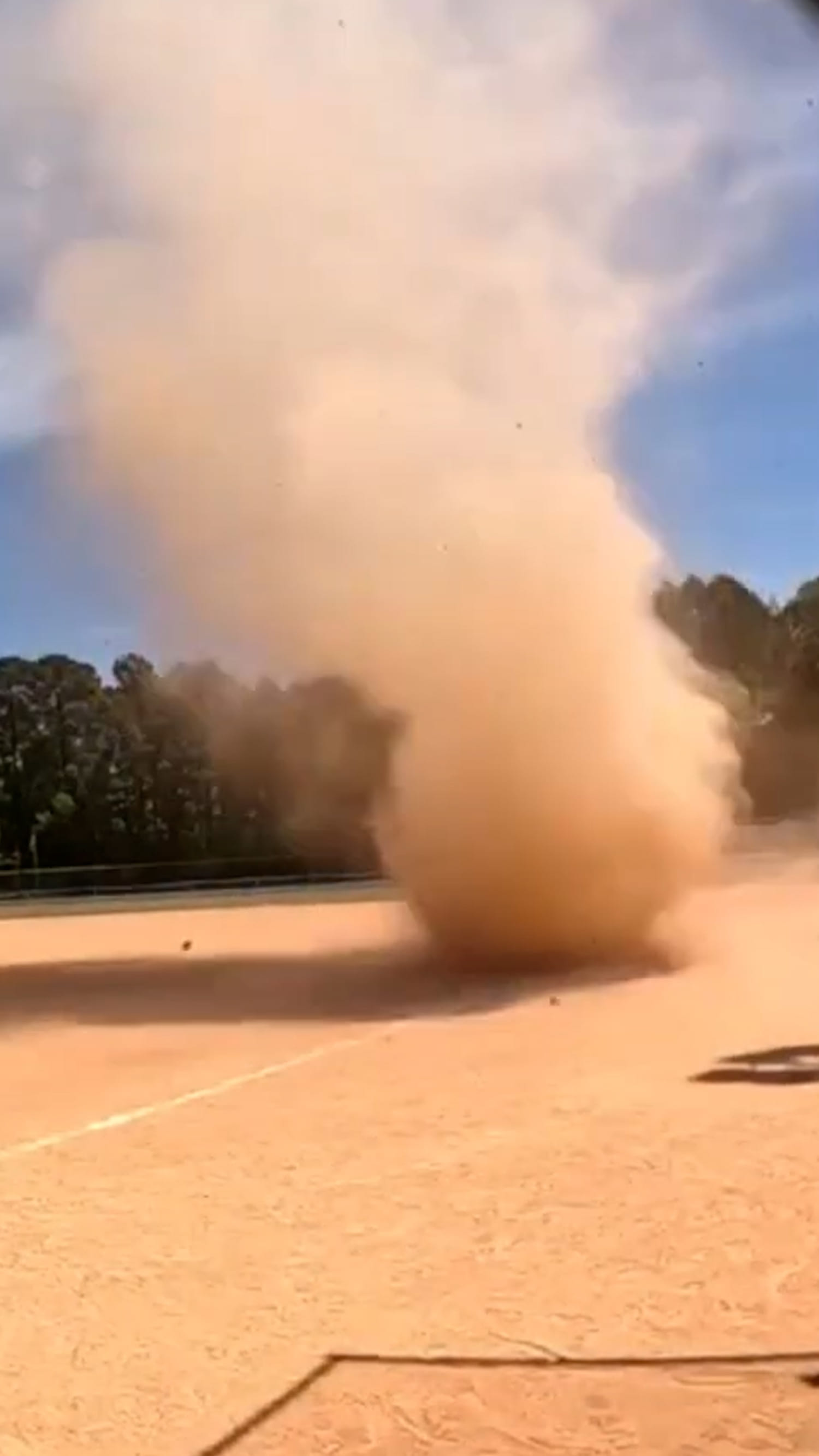 Dust devil tears through North Carolina baseball game