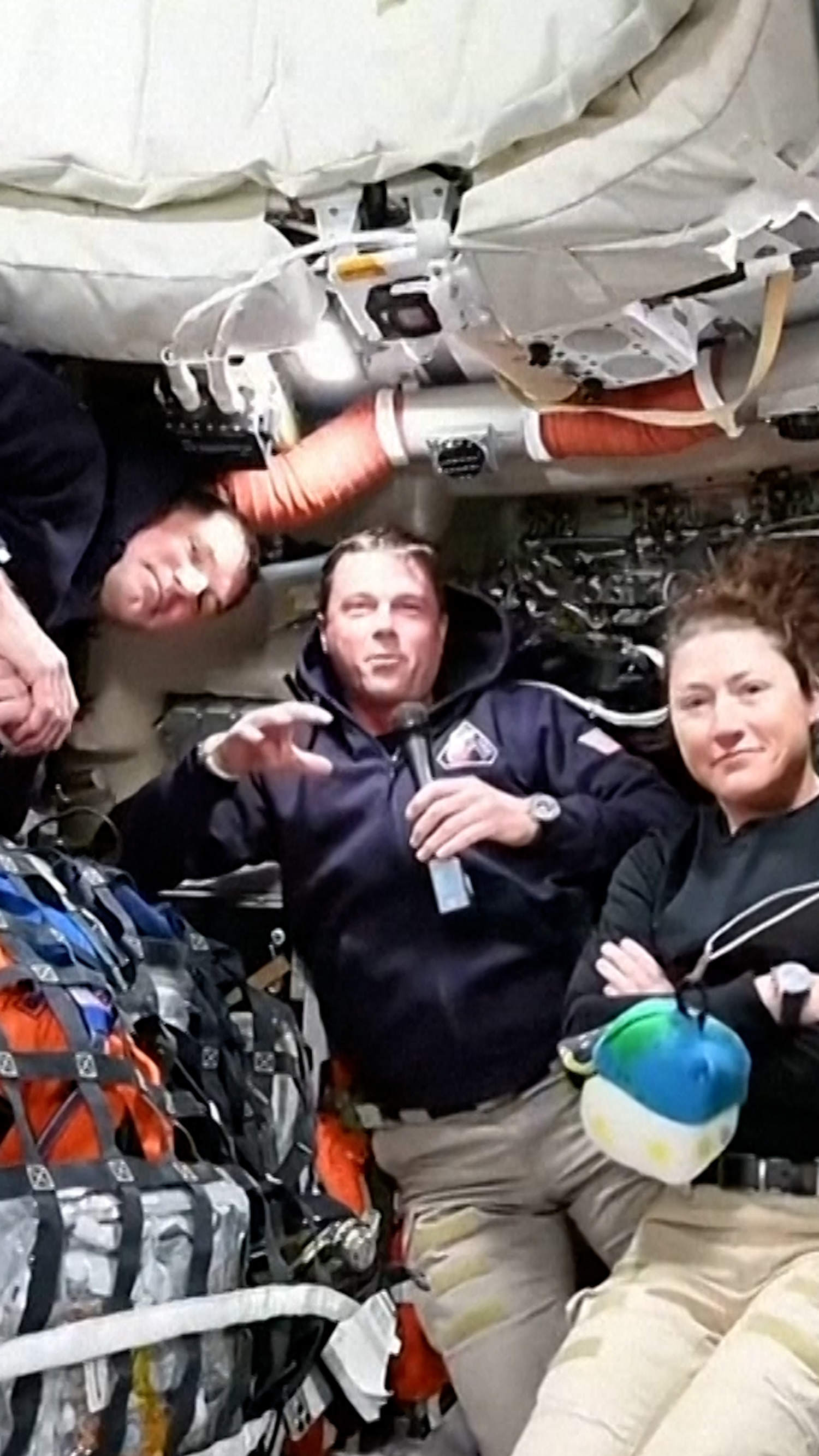 Astronauts describe space as they rocket toward the moon