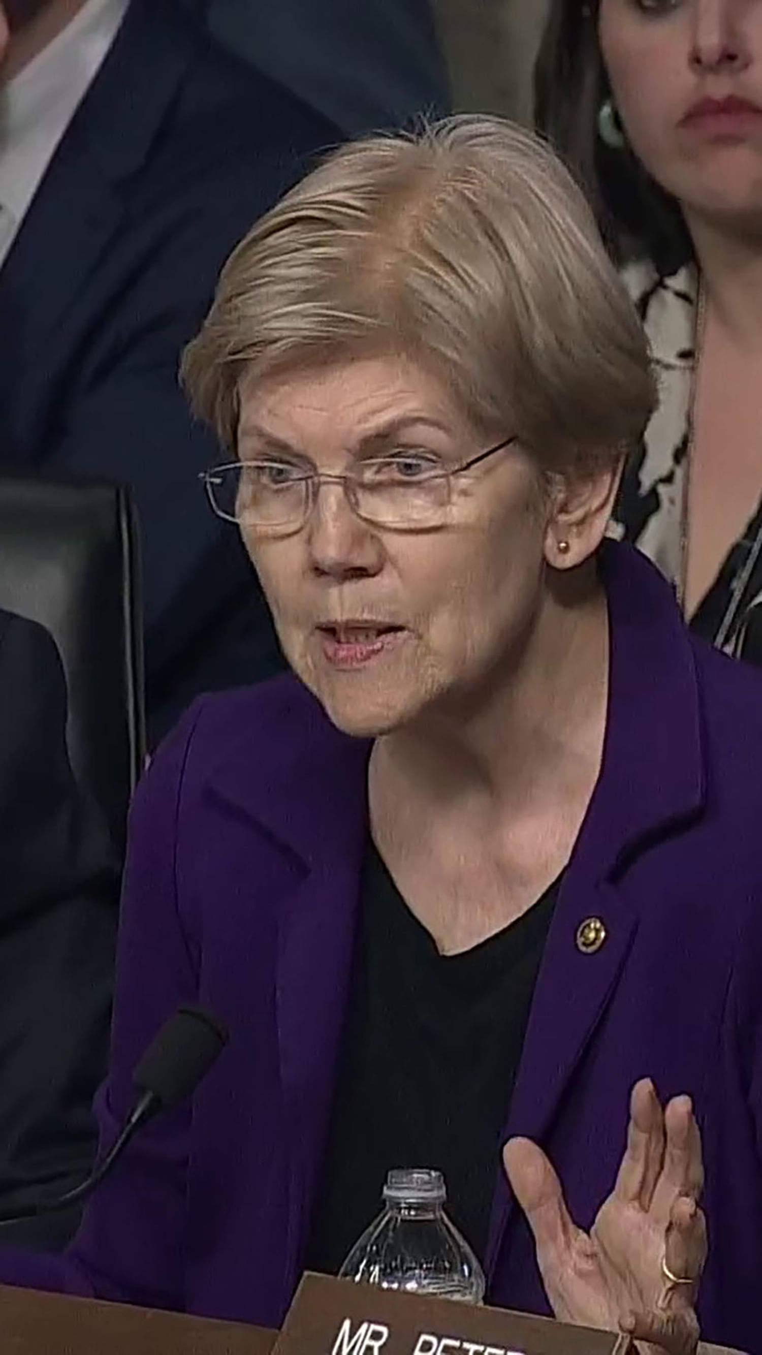 Warren questions Hegseth about insider trading