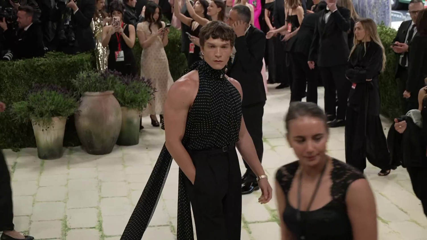 Connor Storrie turns heads in sleeveless black ensemble