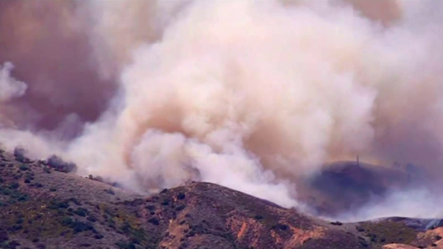 Massive wildfires tear across Western U.S.