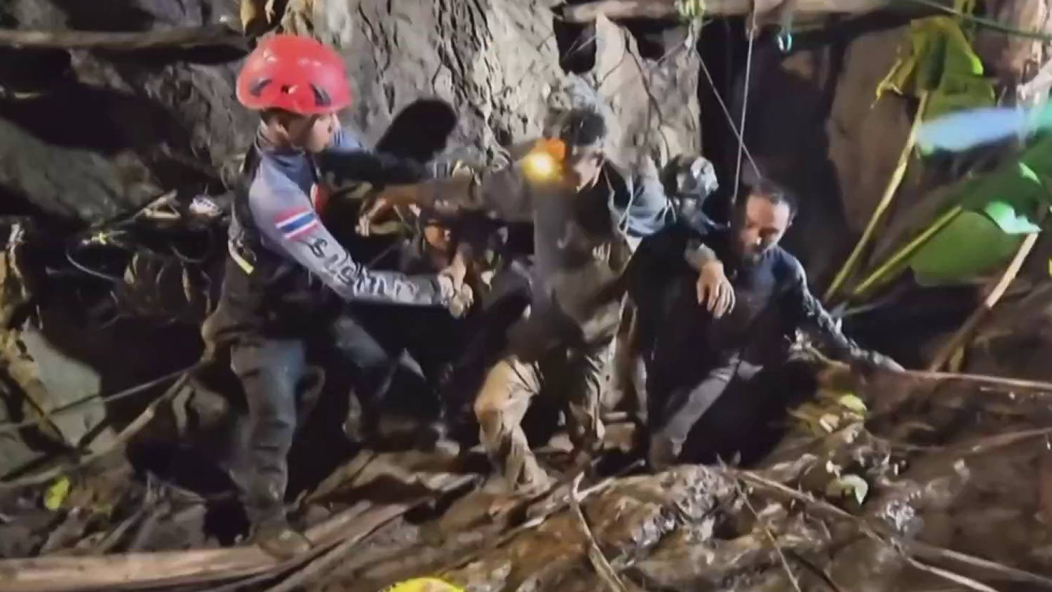 Four still remain trapped in the flooded Laos cave after one person was rescued