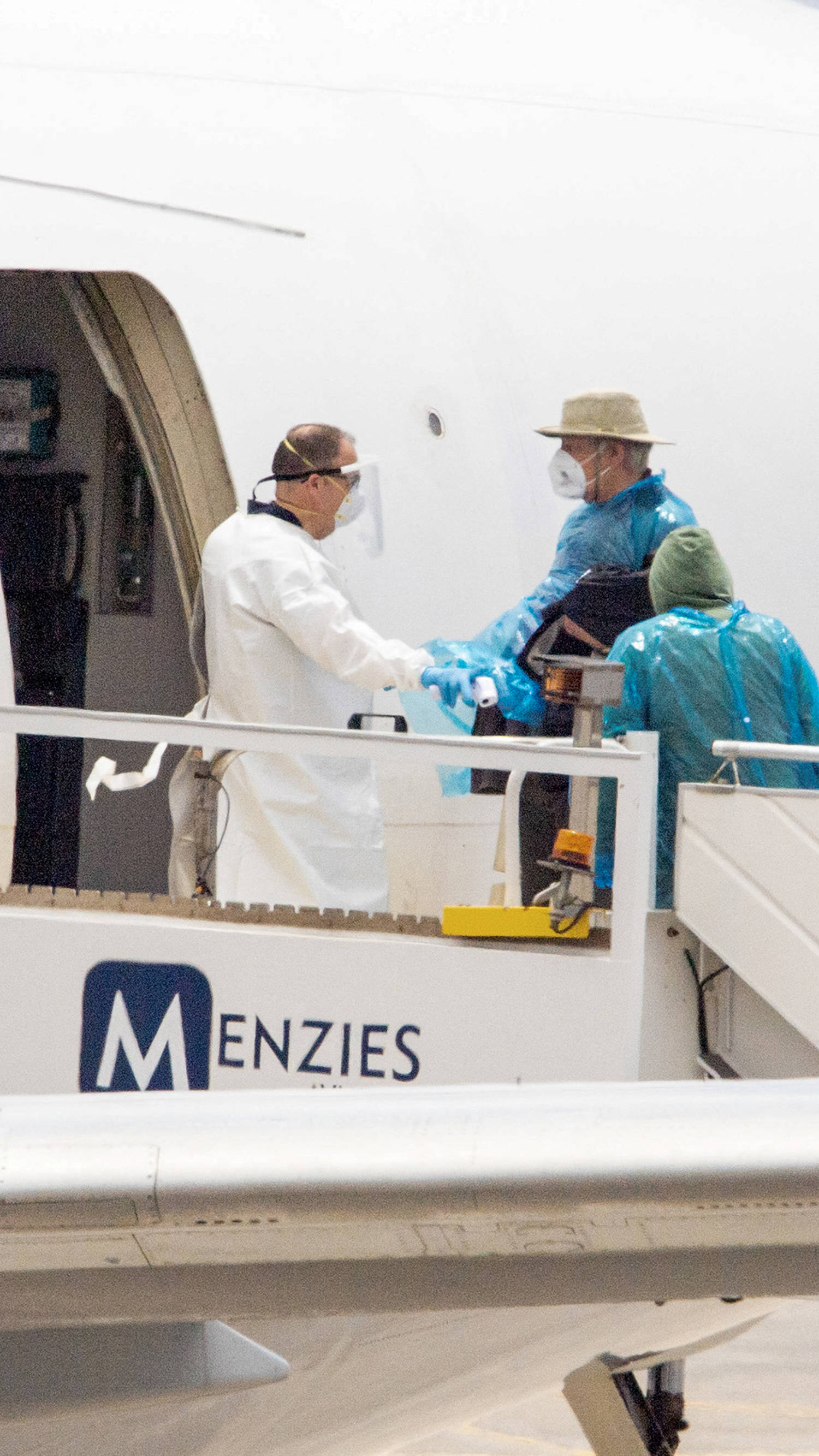 Passengers disembark from hantavirus-stricken cruise