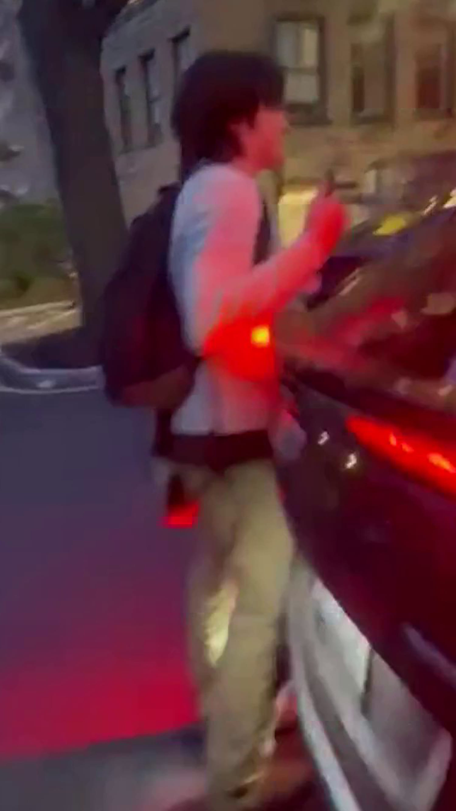 Cornell president accused of backing car into student