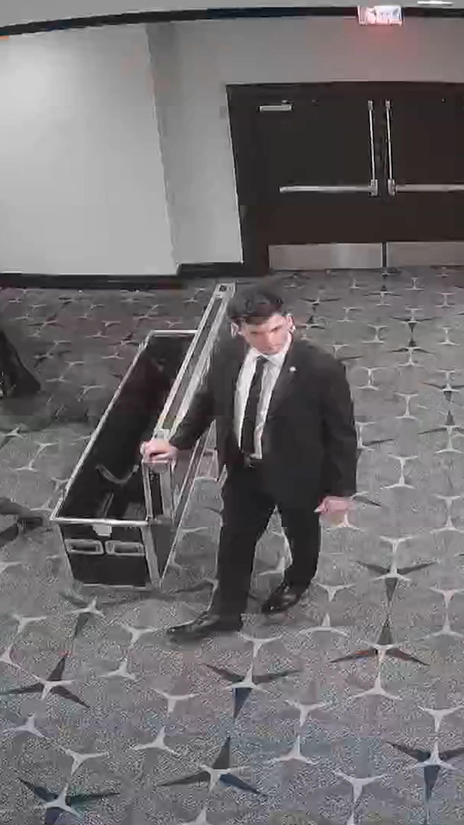 Video shows shooting suspect running through security