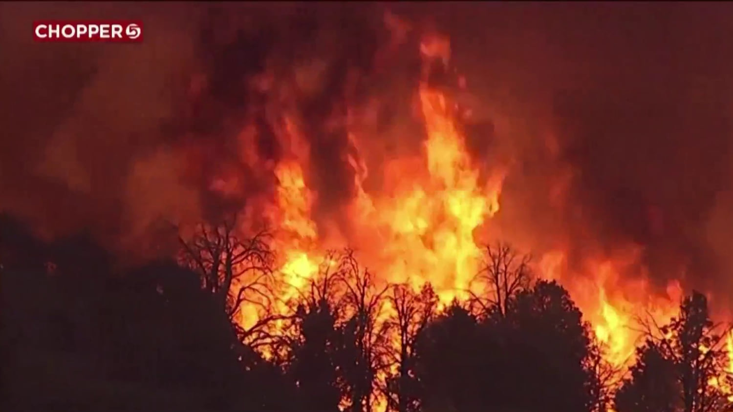 Dangerous fire, flood conditions prompt states of emergency