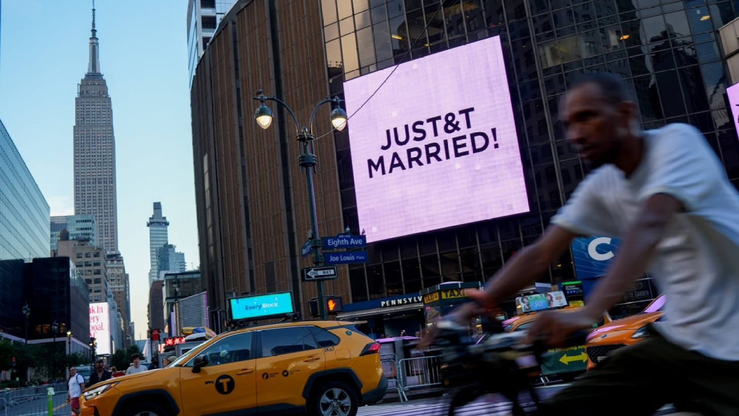 'Just Married' message appears on MSG video screen during Emilie Ikeda's report