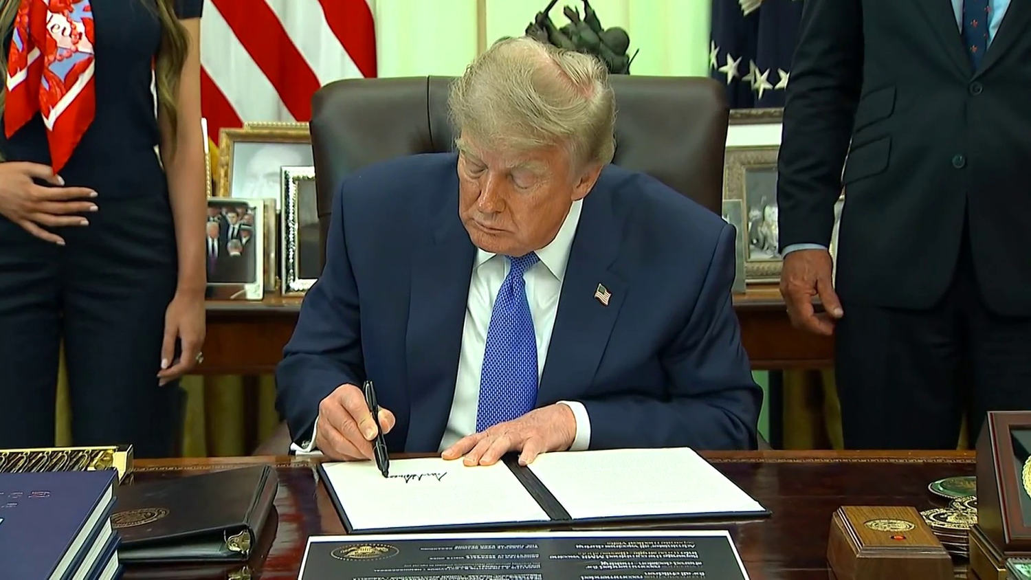 Trump signs executive order on childhood vaccines