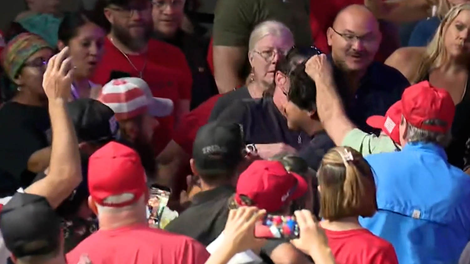Protester grabbed by audience member at Texas Trump rally