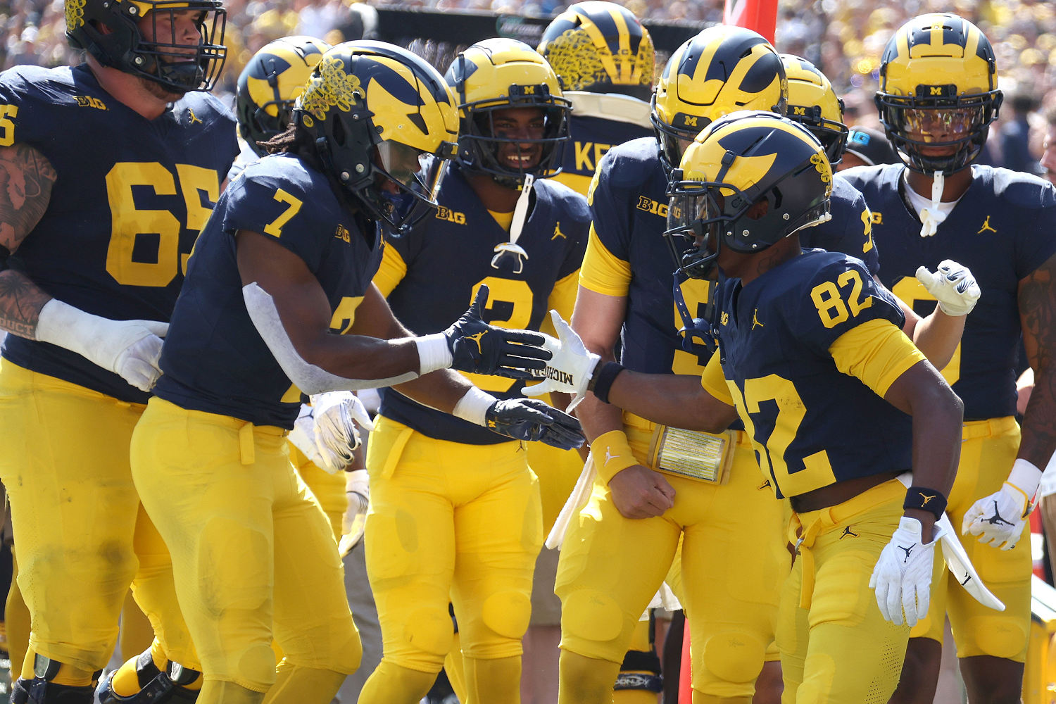 University of Michigan football program penalized for Covid-era recruiting violations, NCAA says