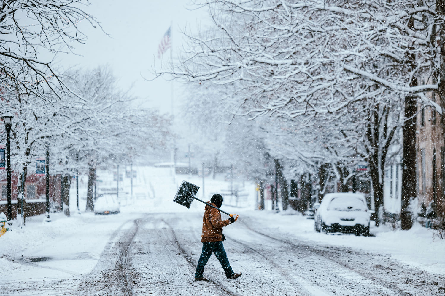Winter storms dump snow on both U.S. coasts as icy roads make for hazardous travel 