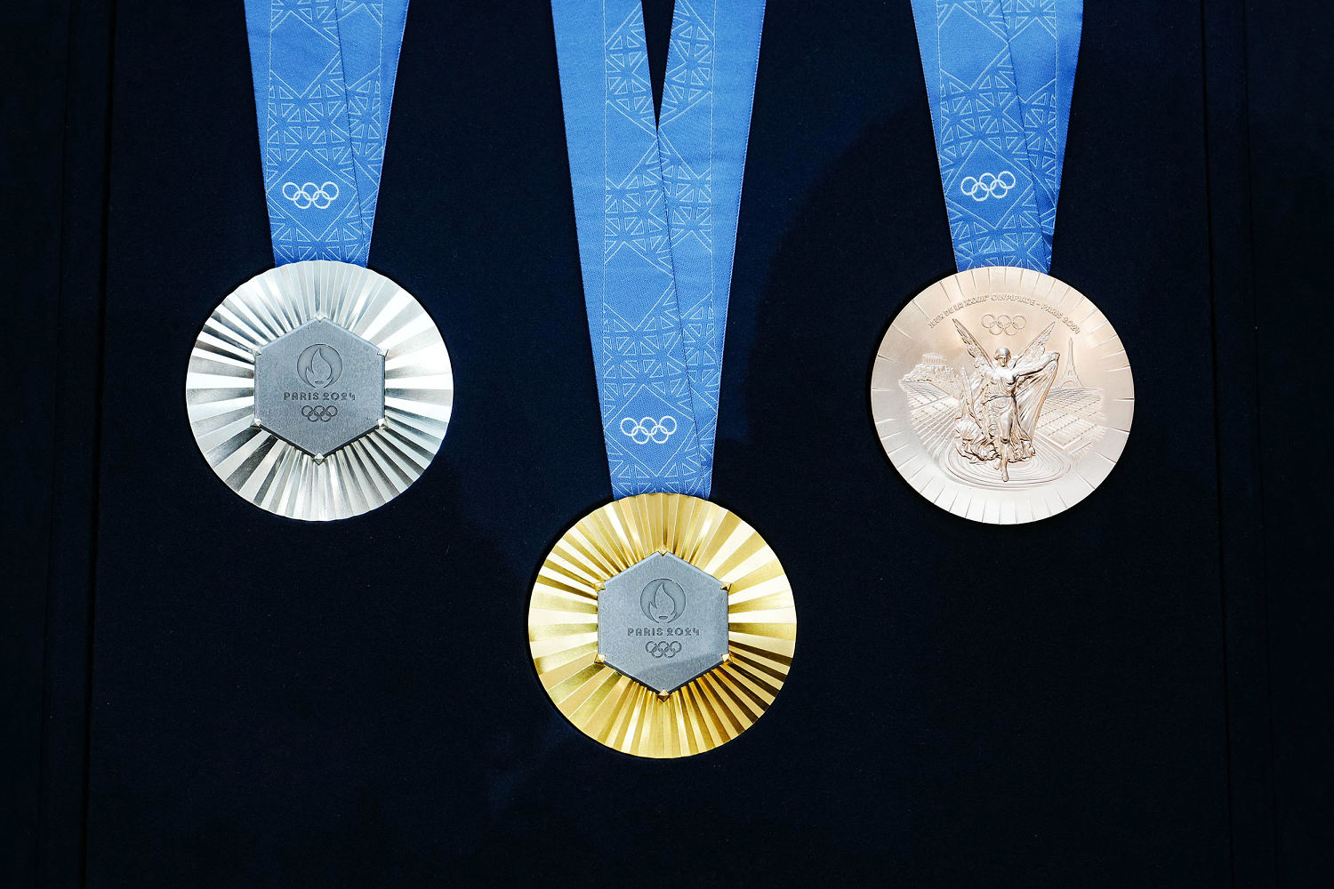 The Paris Olympics medals are monumental: They're embedded with pieces of the Eiffel Tower