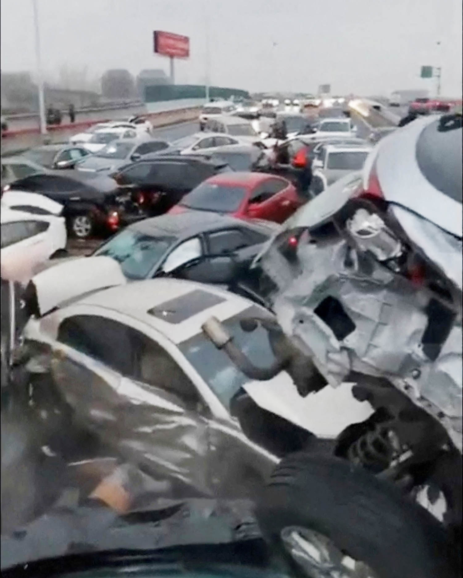 100-car pile-up snarls traffic in China as cold snap disrupts travel across country