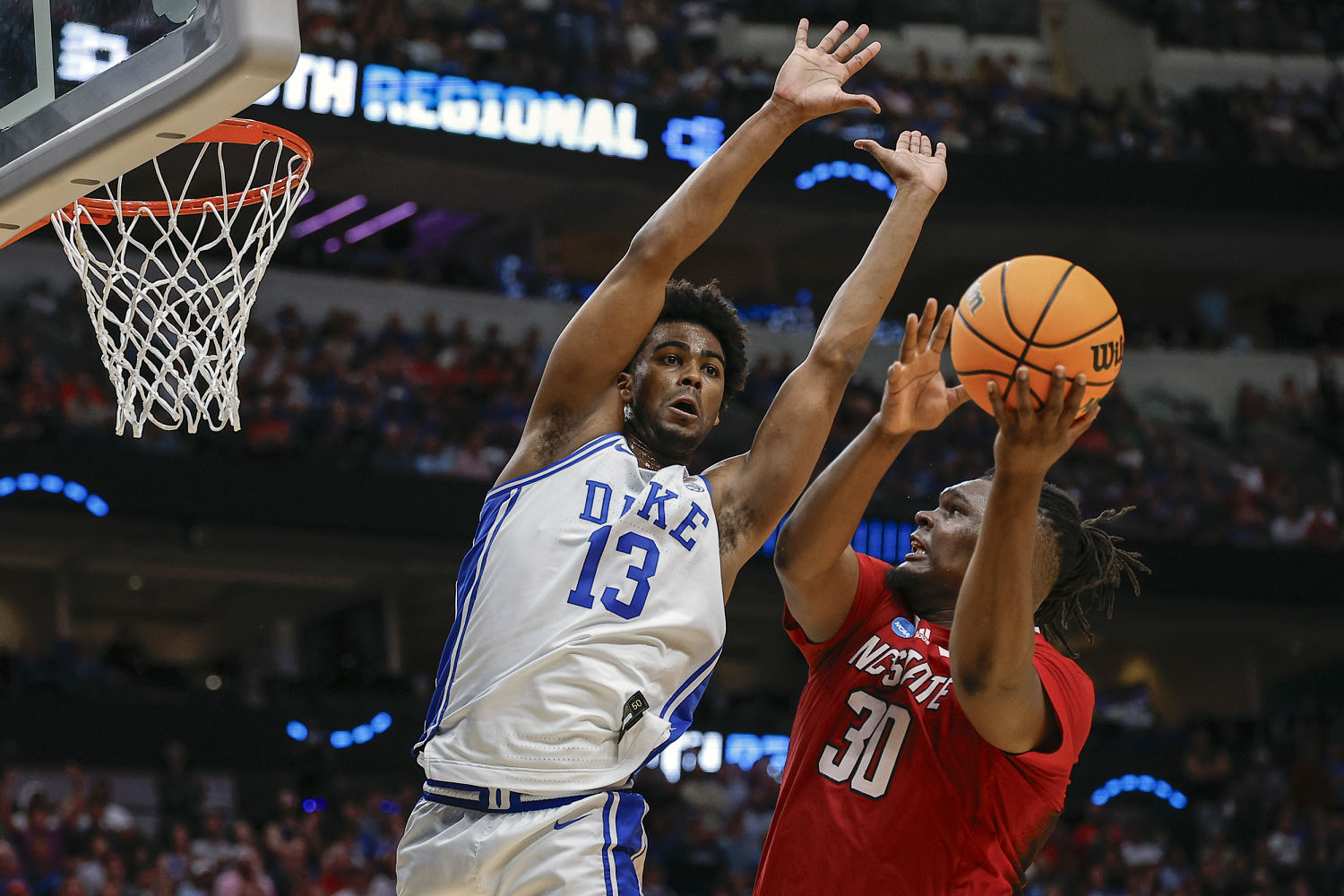 Men's NCAA Final Four is set with 11th seed N.C. State's shocking upset of Duke
