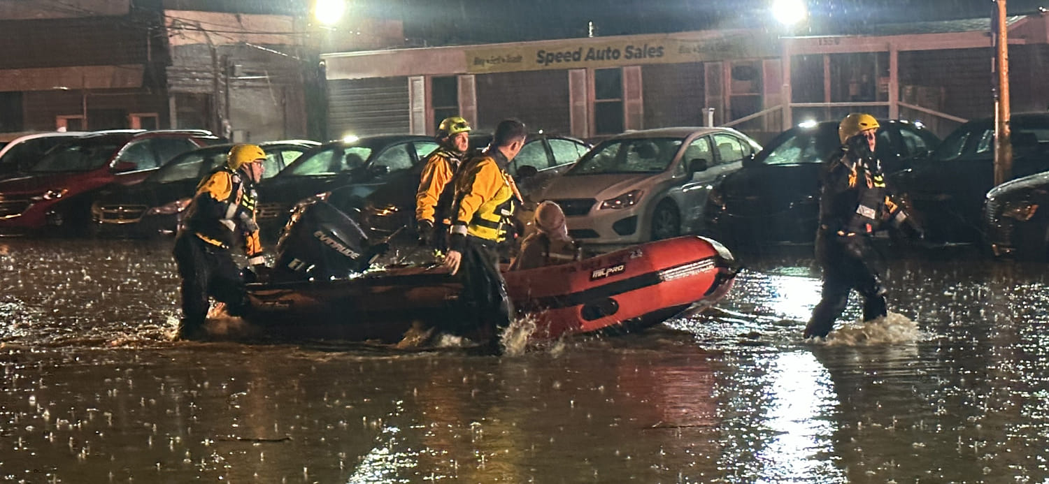 Record rain brings dangerous flash flooding and strong winds to Northeast