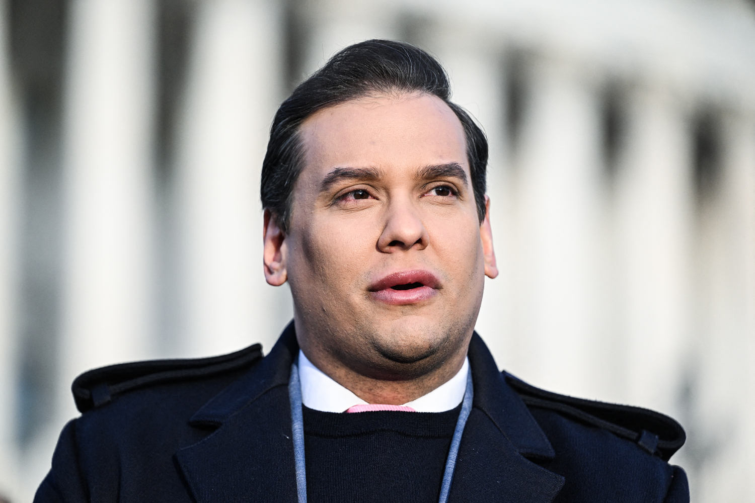 Former Rep. George Santos says he will only pay restitution if he's required by law