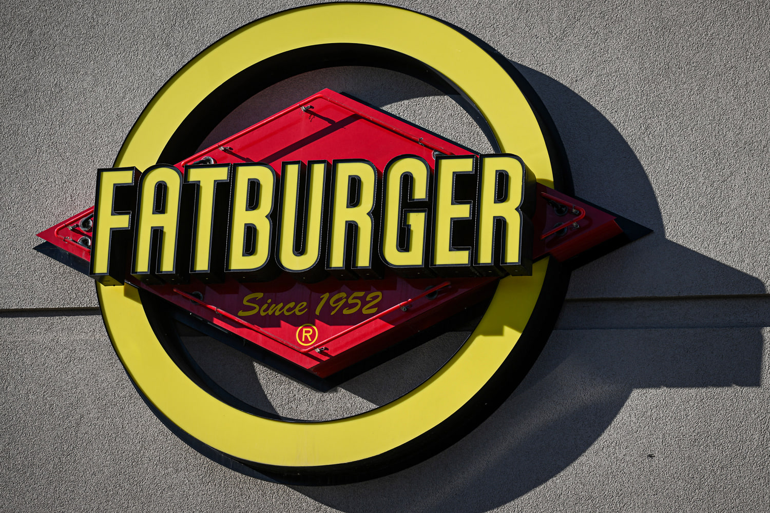 Fatburger parent company, chairman charged in alleged fraud scheme