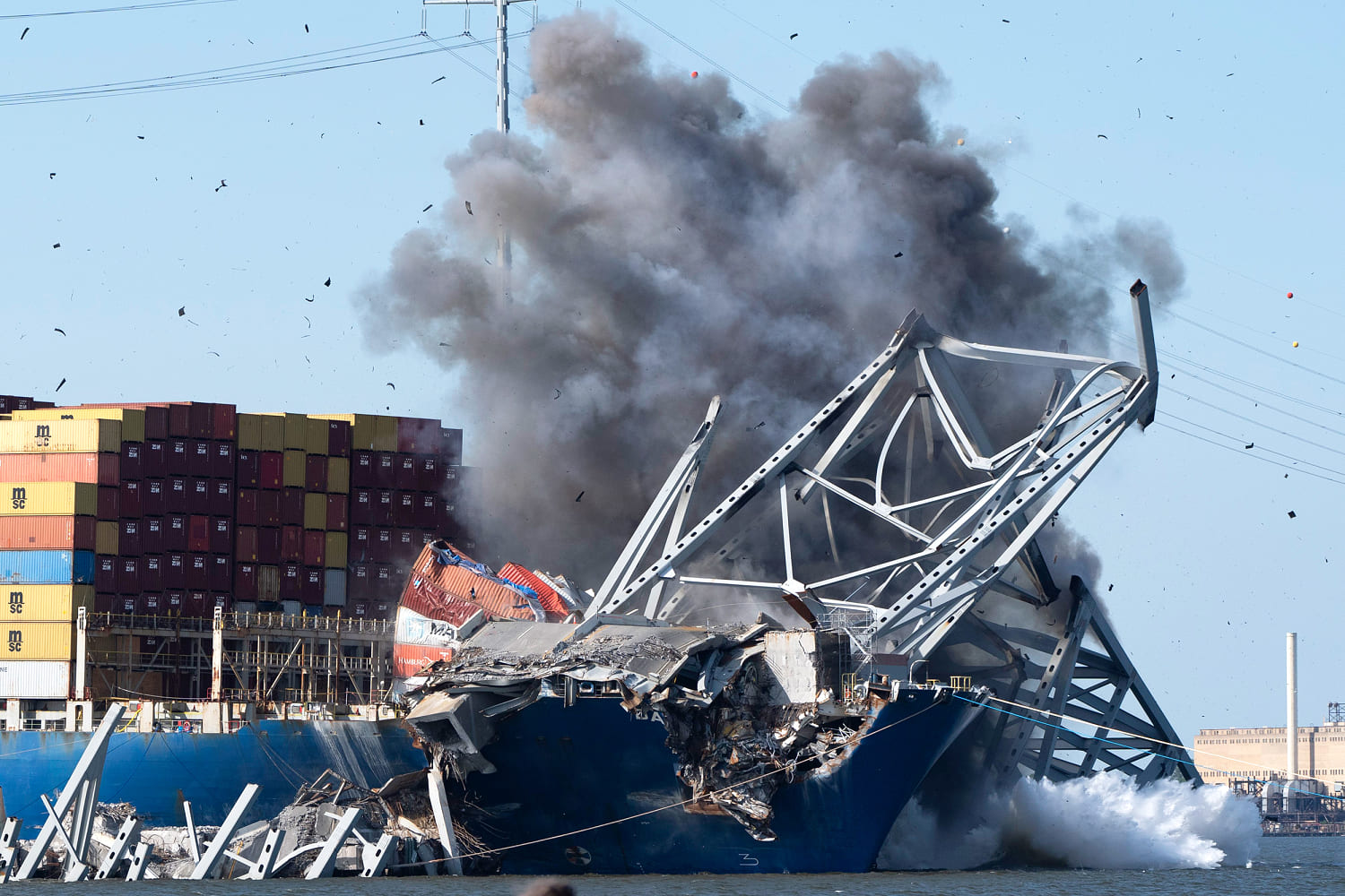Baltimore bridge span removed, ship freed with precision blast