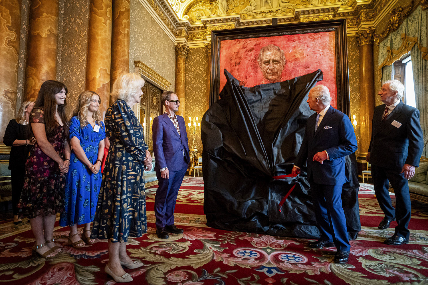 King Charles unveils his first portrait since coronation at Buckingham Palace 