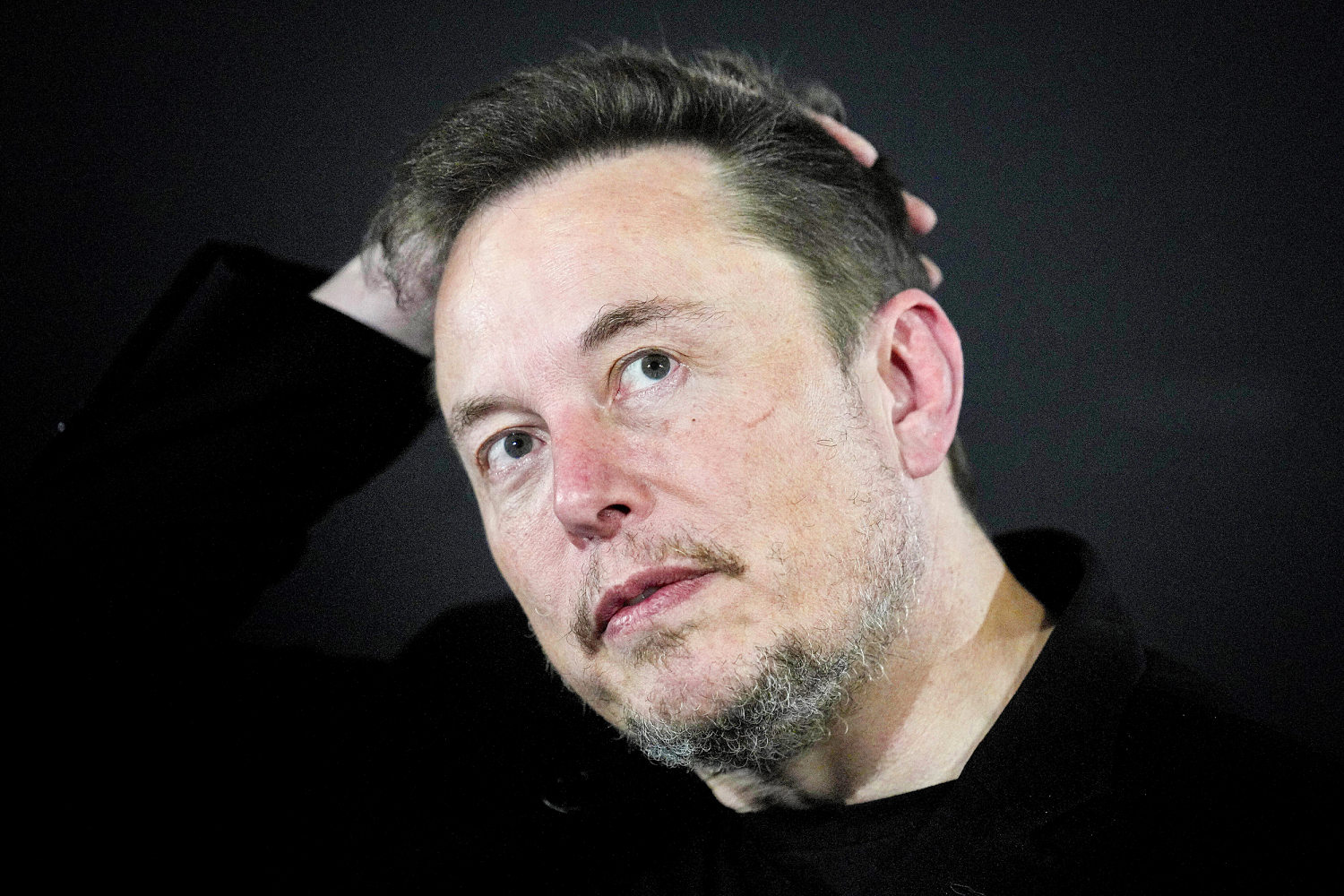 Last year, Elon Musk cursed at advertisers. Now he says he didn't mean it.