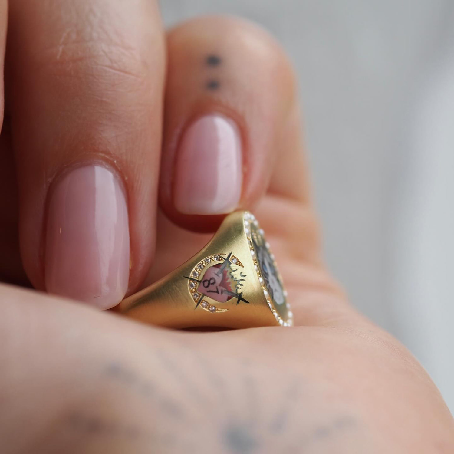 EXCLUSIVE: Taylor Swift's new ring includes Travis Kelce's jersey number. The ring's designer shares why