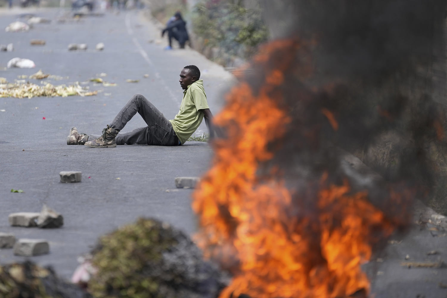 Tear gas, stones and flames as violence erupts in Kenya and protesters call for president's ouster