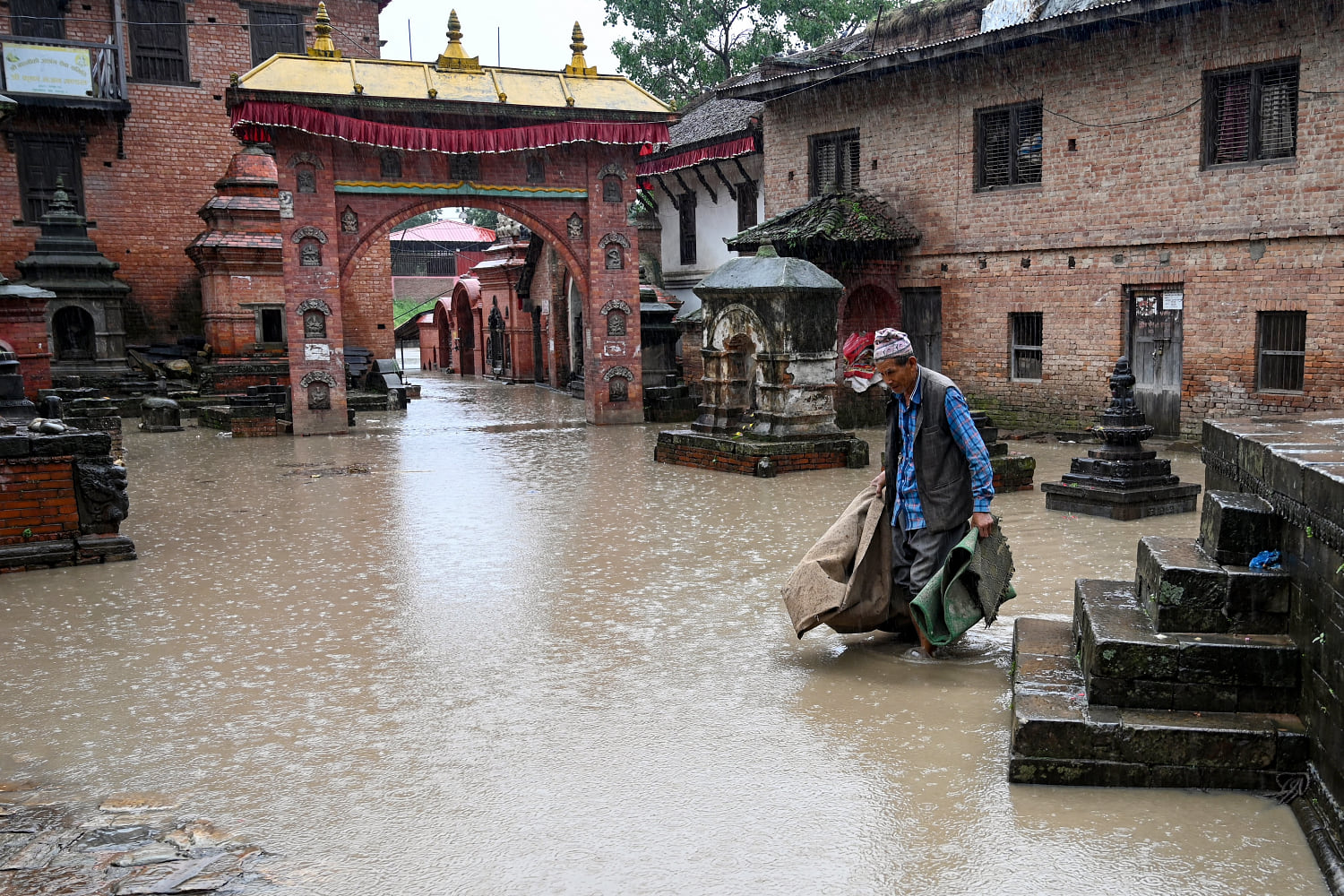Heavy rains trigger landslides in Nepal, 11 killed, 8 missing