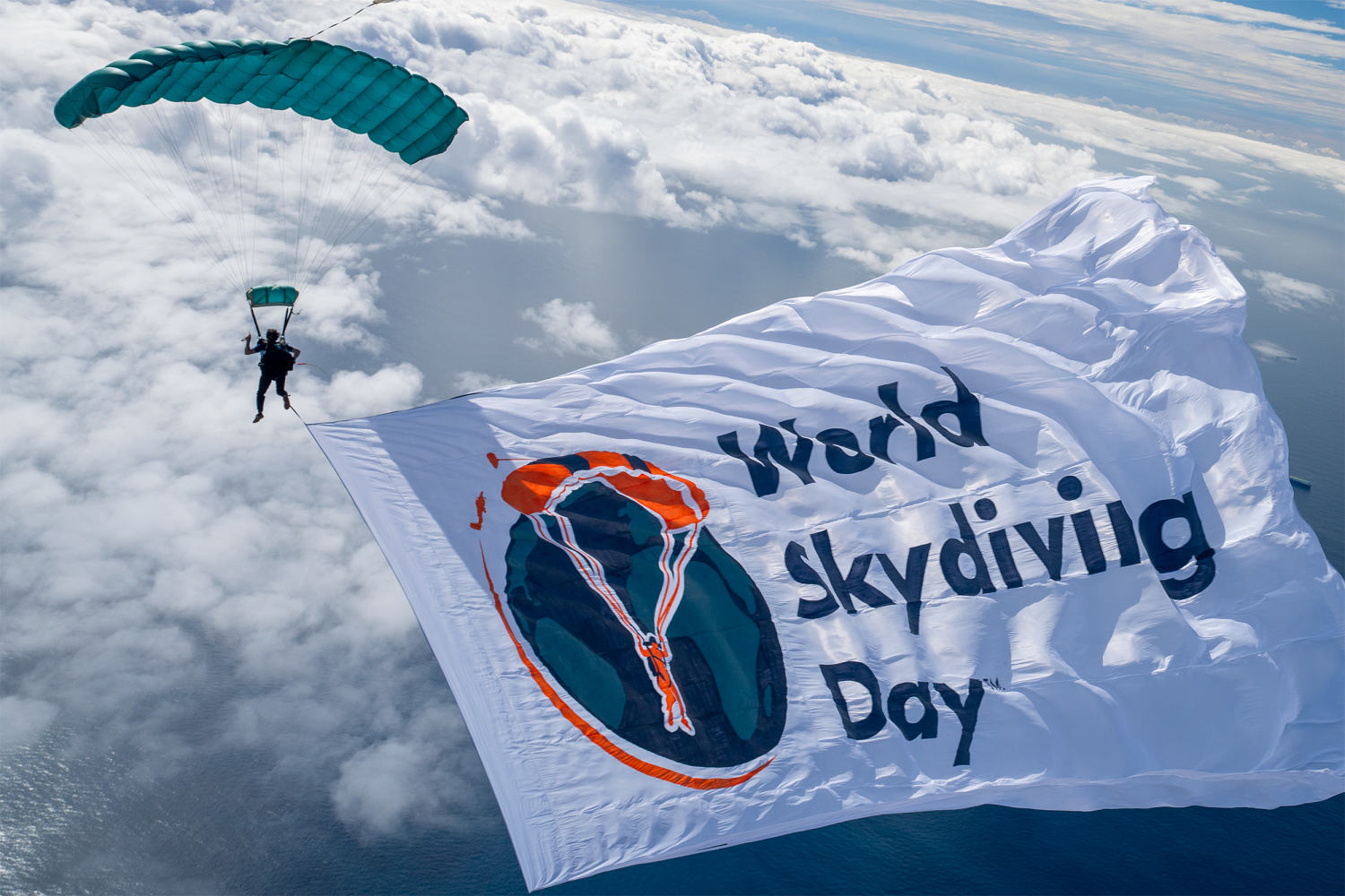 Look up: 100 daredevils of color plan epic jump for World Skydiving Day