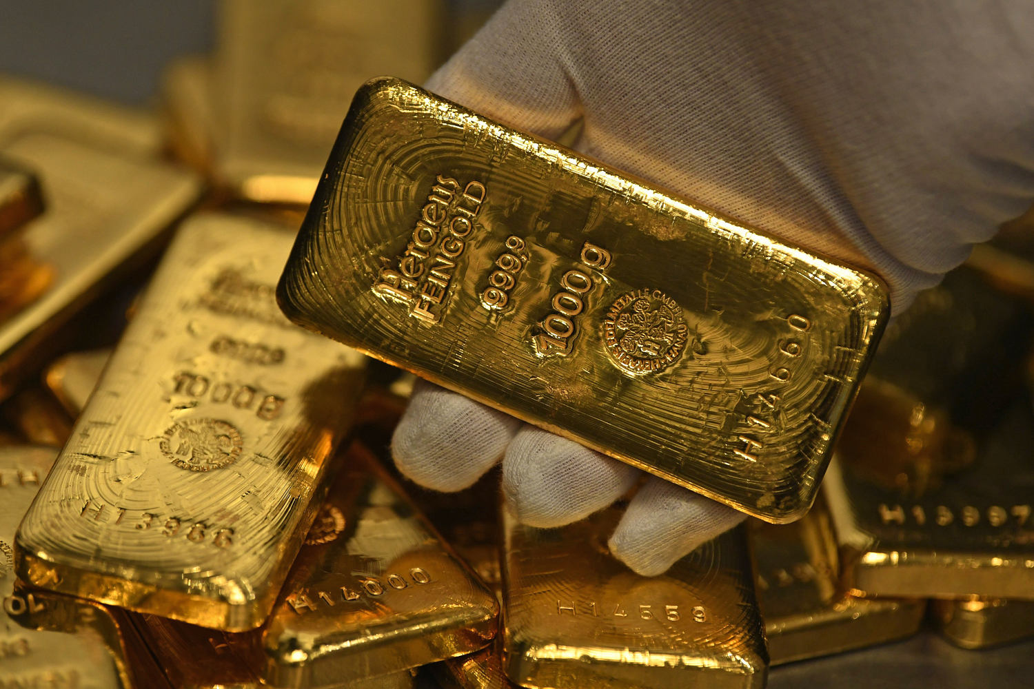 Gold jumps to record above $2,460 an ounce on hopes Fed will soon cut rates