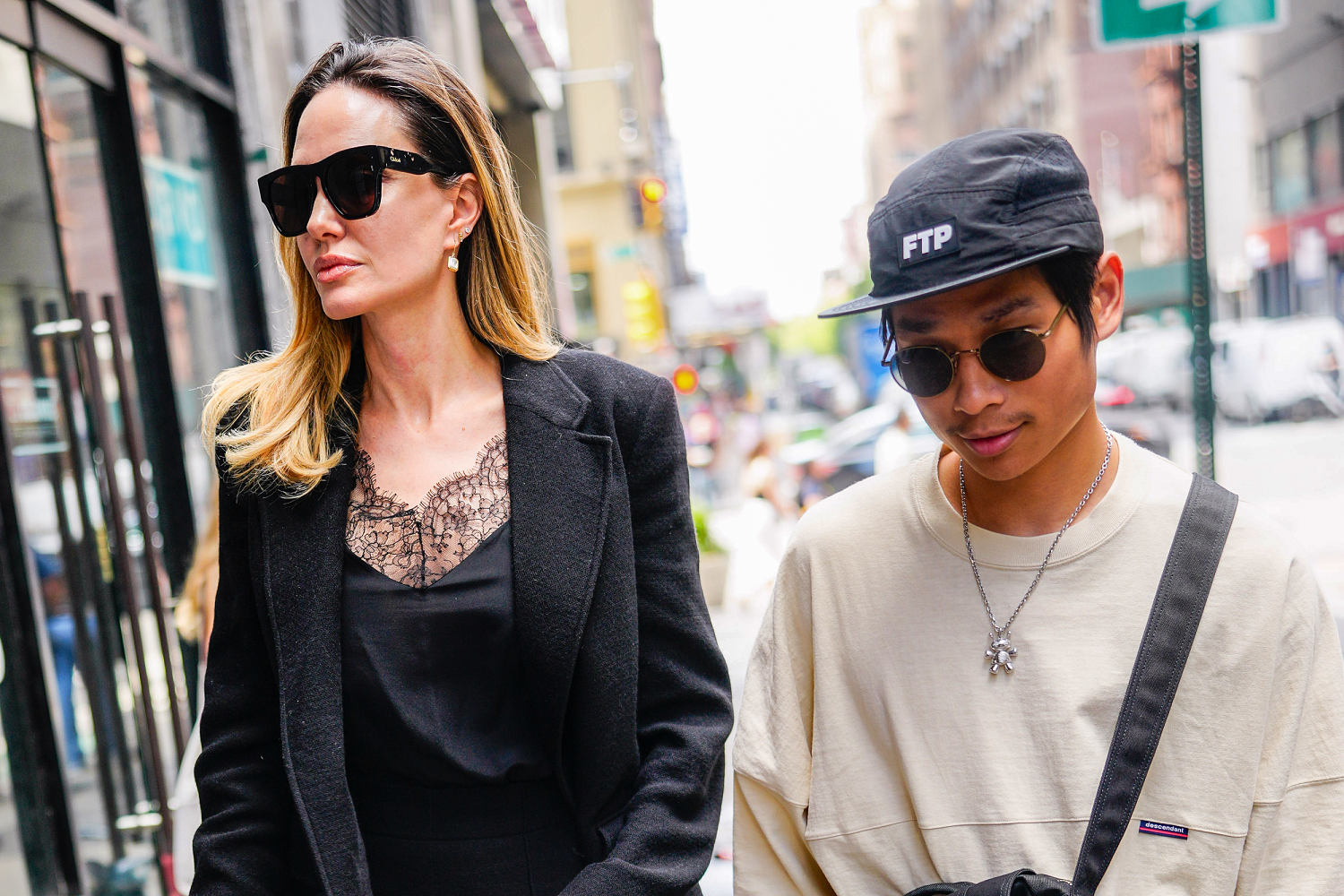 Angelina Jolie and Brad Pitt's son hospitalized after e-bike head injury, source says