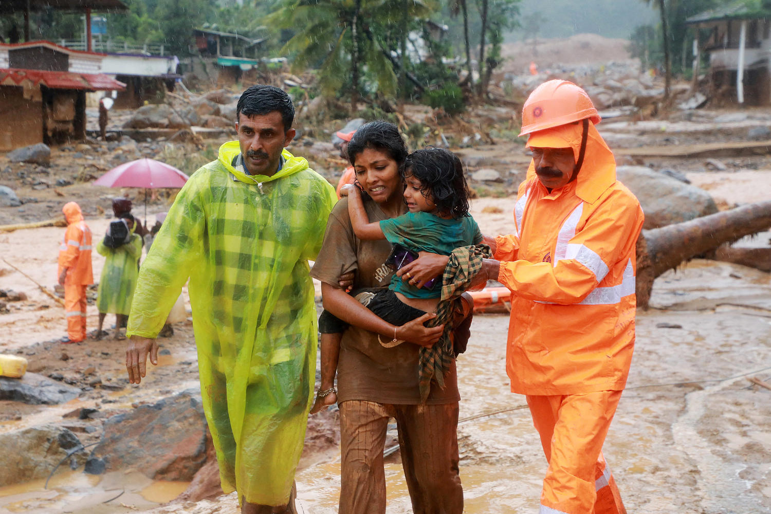 Landslides caused by heavy rains kill 24 and bury many others in southern India