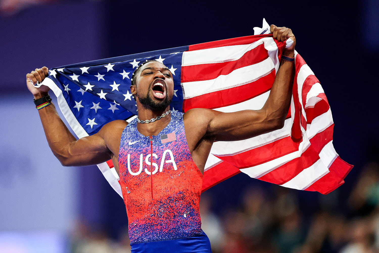 Noah Lyles wins 100-meter in photo finish for first of possible four gold medals