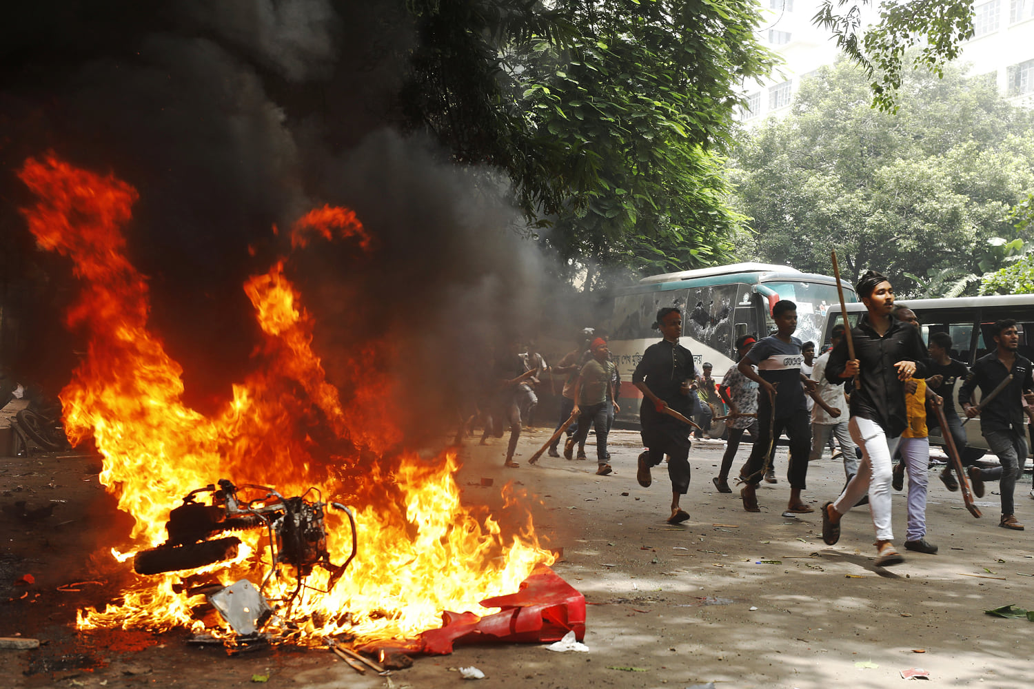 At least 27 killed in Bangladesh clashes, government declares curfew 