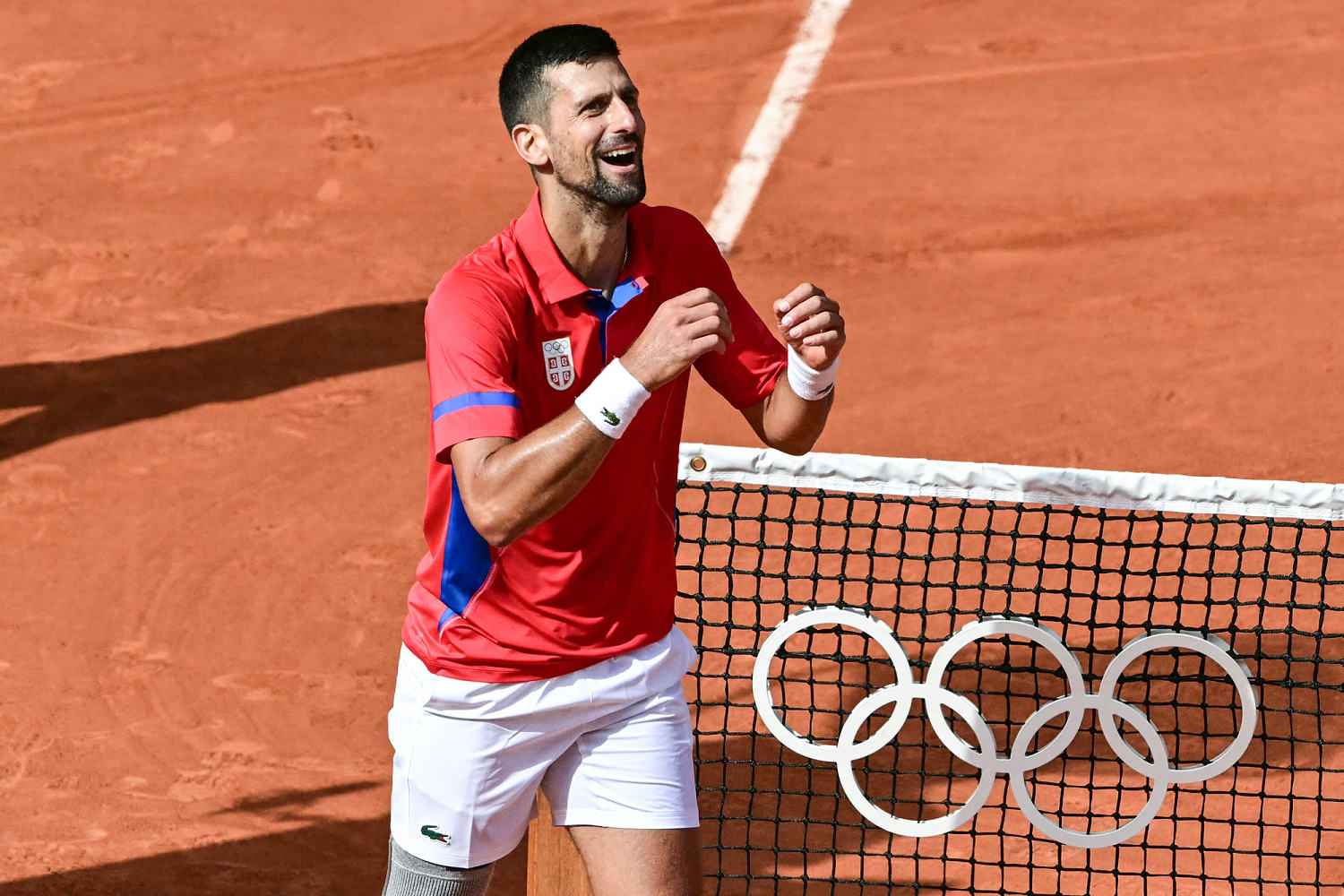 Novak Djokovic defeats Carlos Alcaraz for first Olympic gold medal