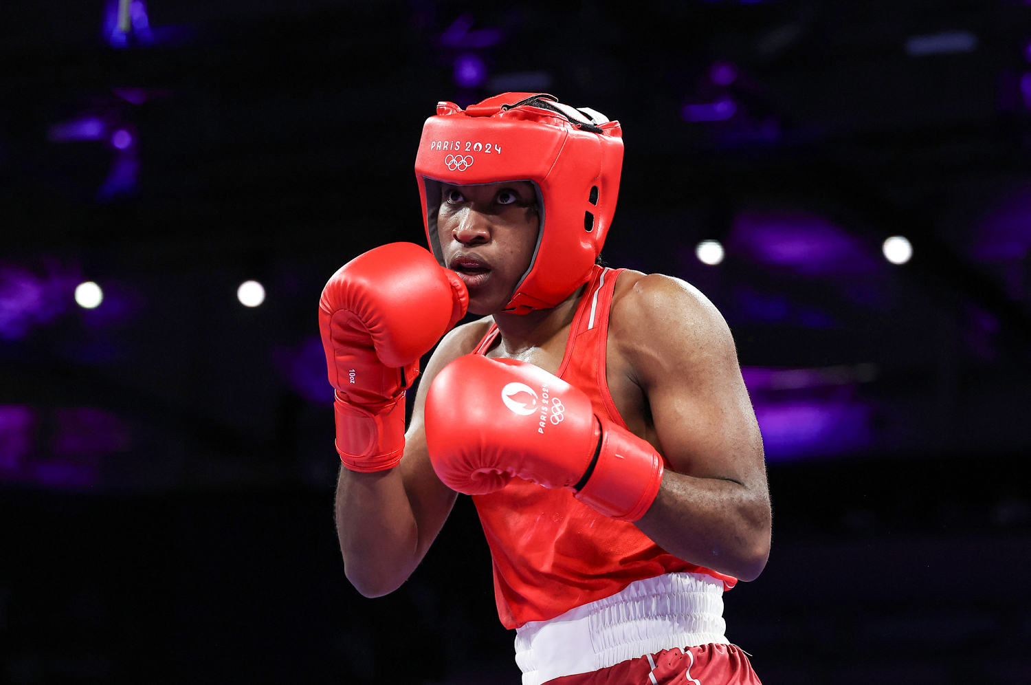 Lesbian boxer becomes first Refugee Olympic Team athlete to win a medal