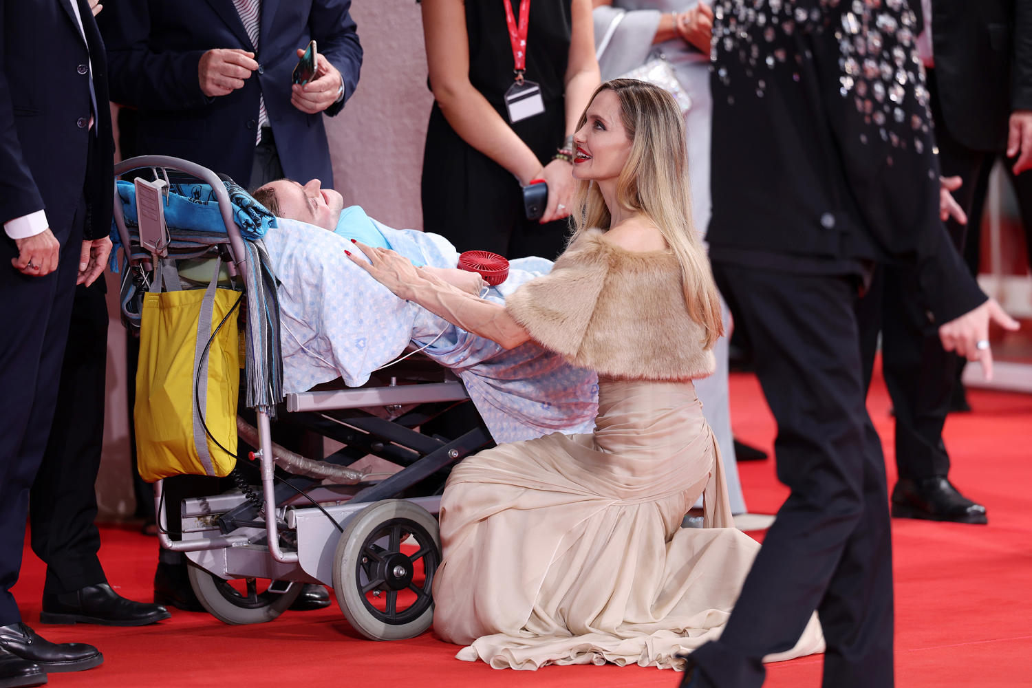 Angelina Jolie stops to greet fan with rare bone disorder during red carpet for 'Maria'