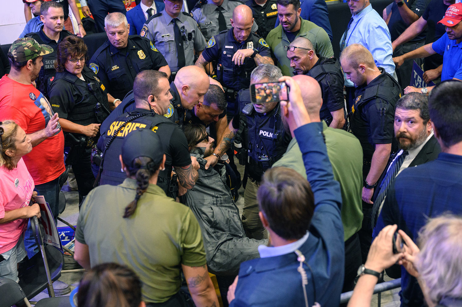 Protester who interrupted Trump rally to face charges, police say