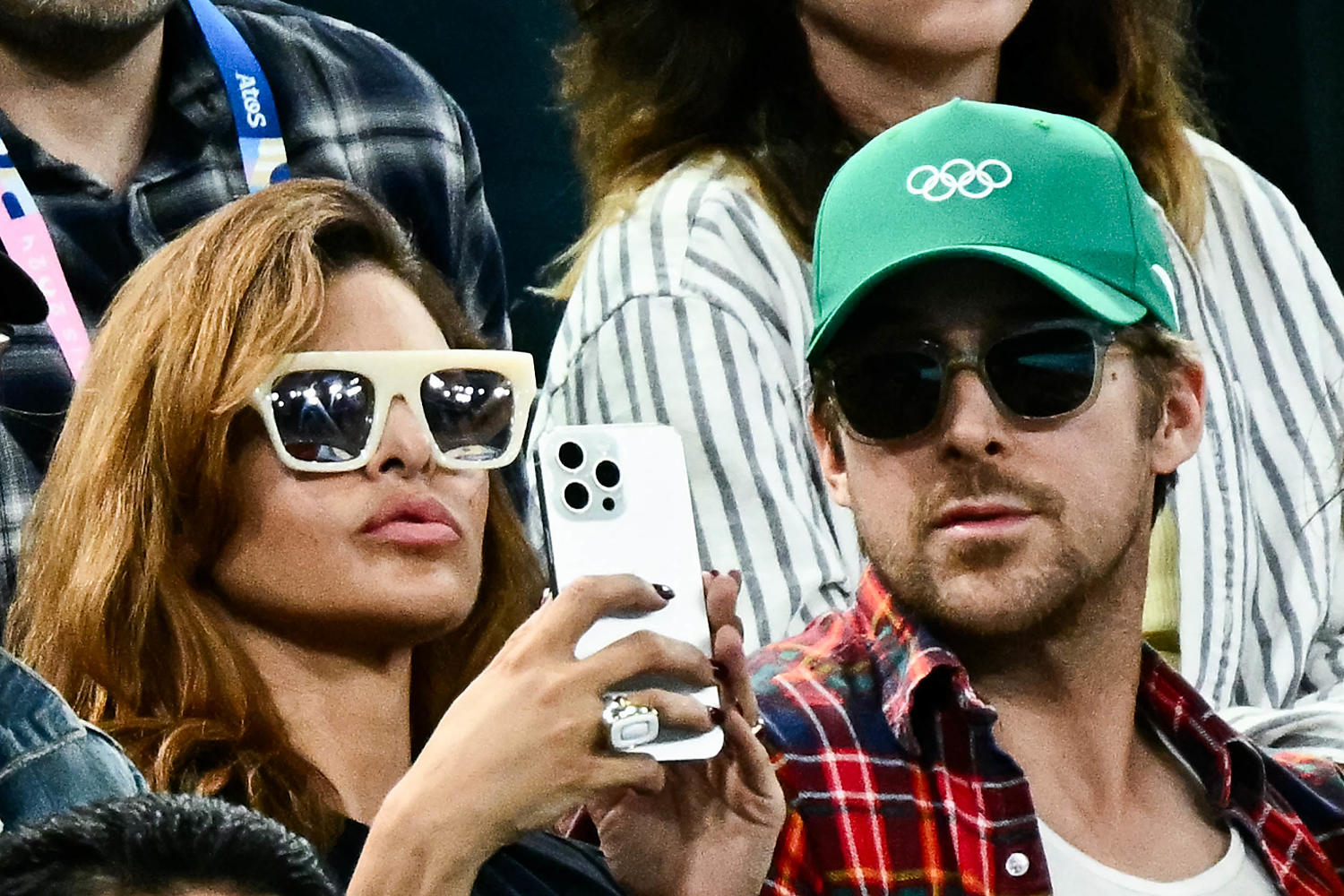 Ryan Gosling and wife Eva Mendes make a rare appearance with their daughters at the Olympics