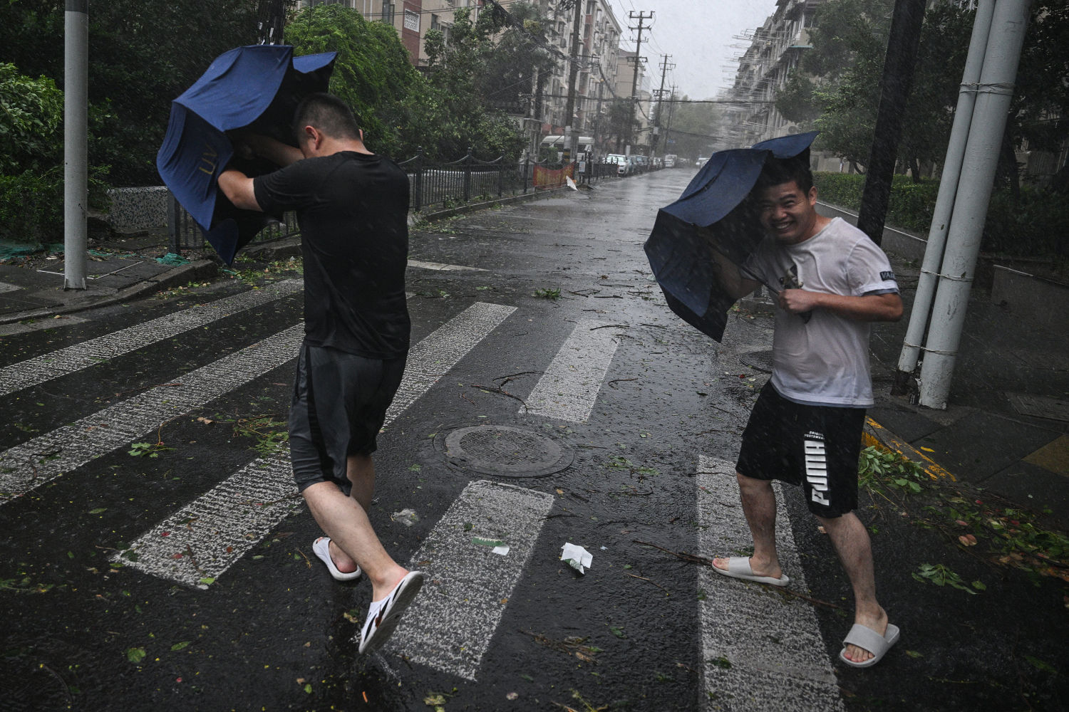 Typhoon Bebinca lashes Shanghai in strongest storm to hit city since 1949