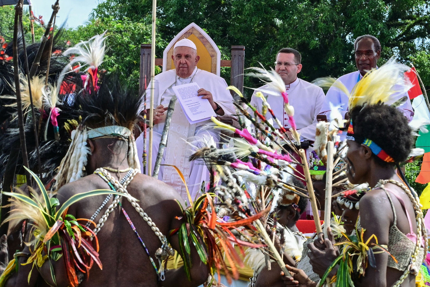 Pope arrives in the remote jungles of Papua New Guinea with humanitarian aid and toys