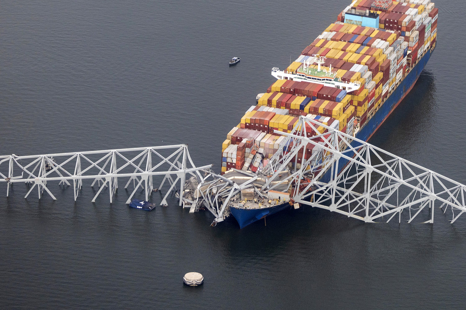 Families of workers killed and injured in Maryland bridge collapse sue owner and operator of cargo ship