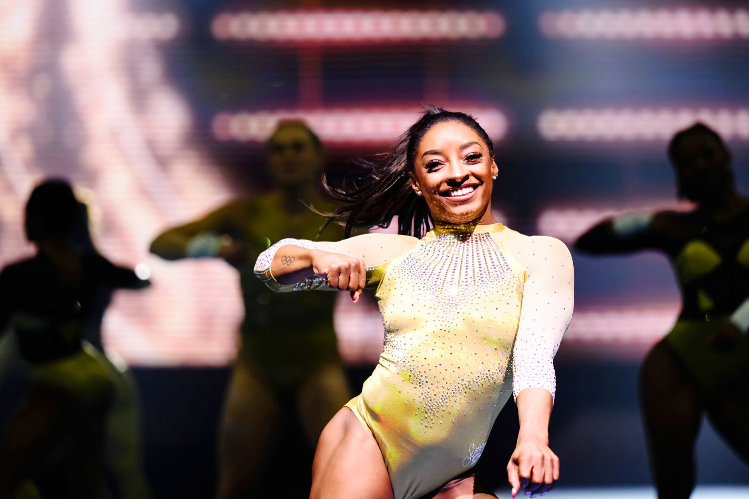 Simone Biles takes a victory lap in high-flying Gold Over America Tour