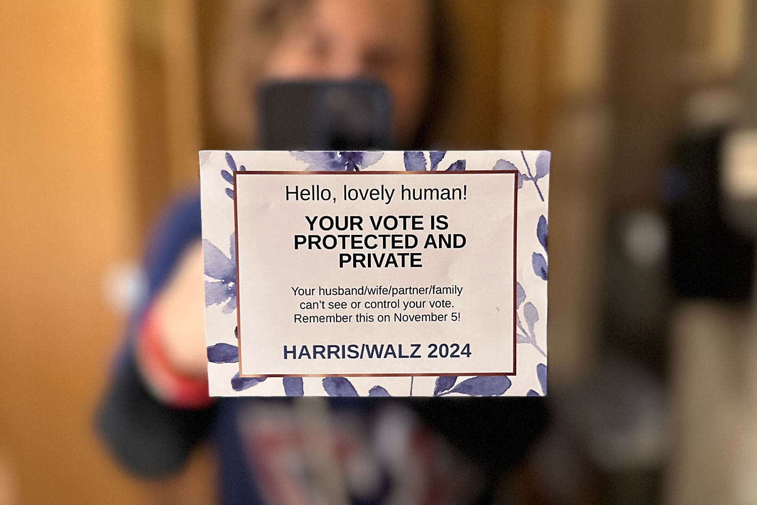 Pro-Harris sticky notes pop up in women's restrooms and gyms and on tampon boxes