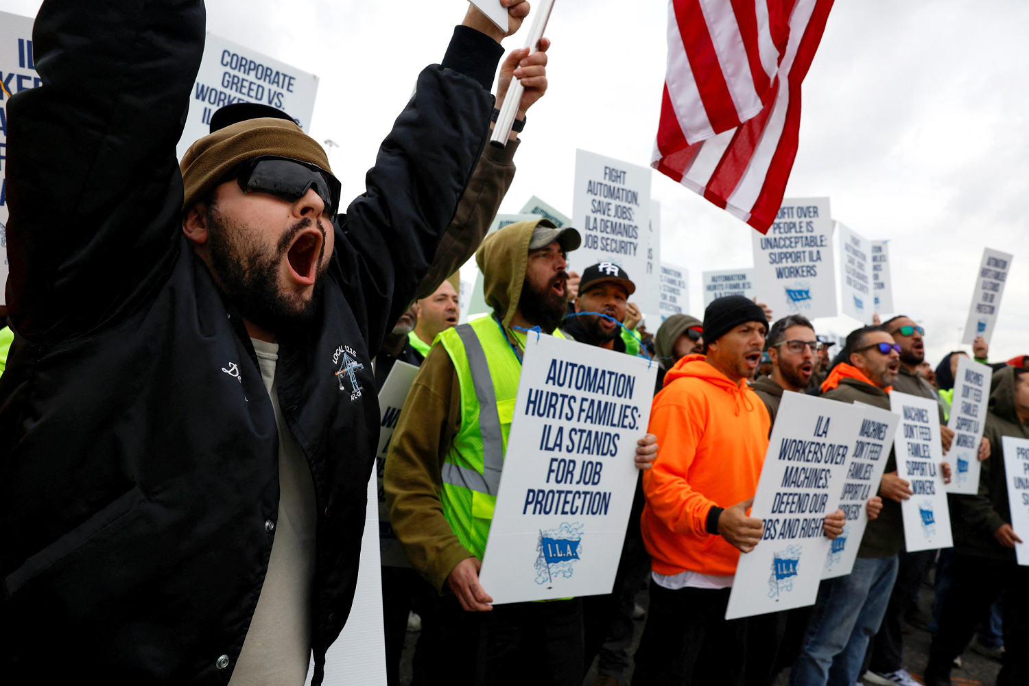 Dockworkers union reach tentative agreement on wages, suspend strike for more talks