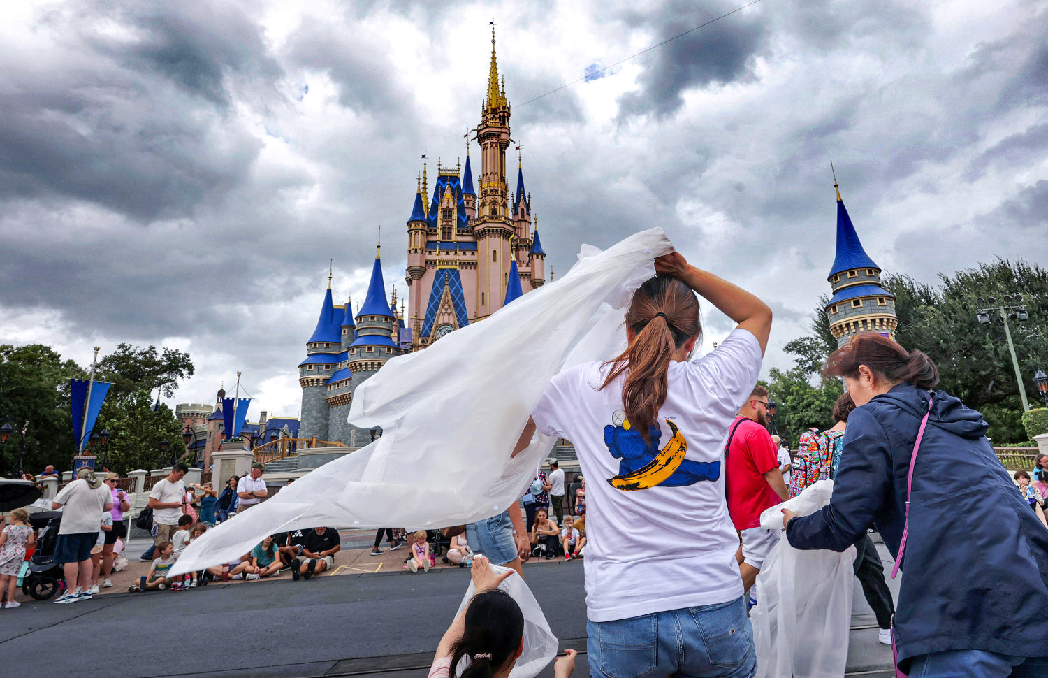 Tourists who came for a sunny Disney vacation are instead stranded by the storm