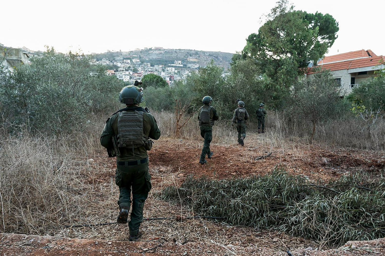 Israel accused of injuring U.N. peacekeepers in Lebanon; dozens reported killed at Gaza school