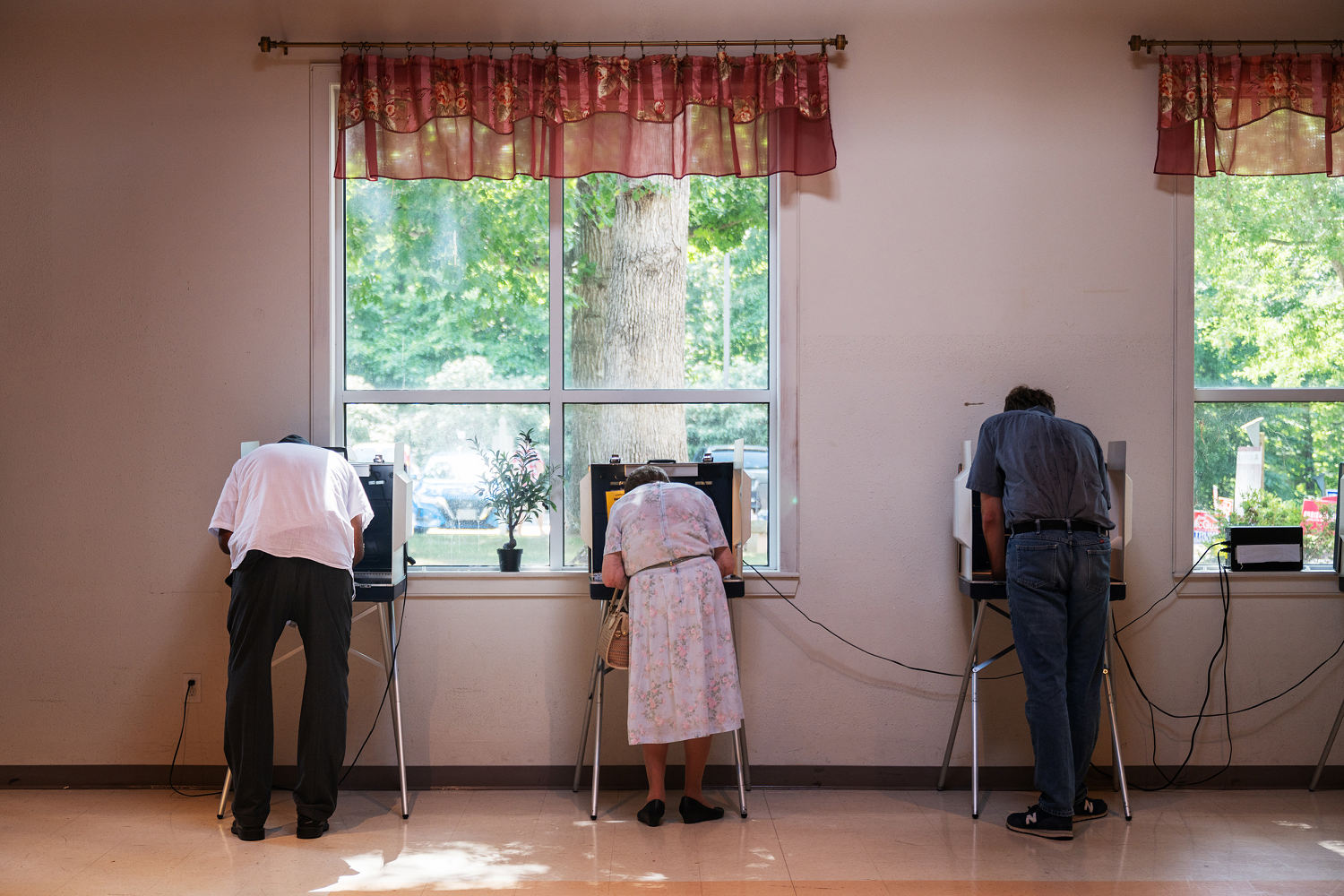 Justice Department sues Virginia over effort to reduce voter rolls close to Election Day