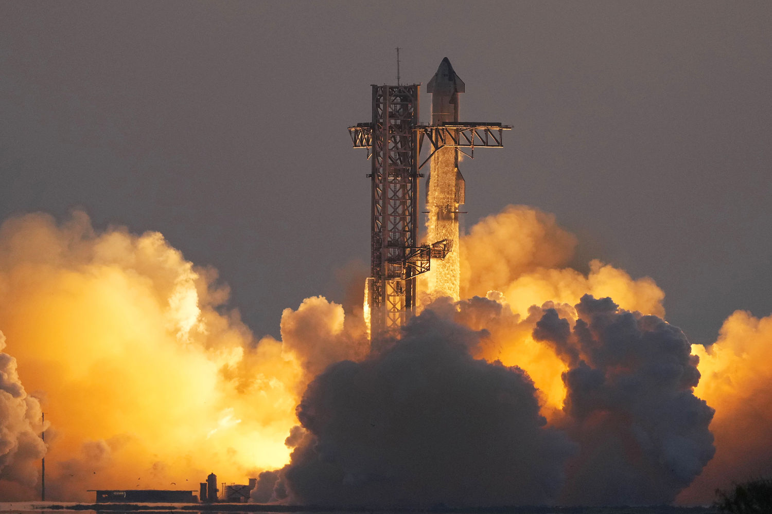 SpaceX catches Starship rocket booster in dramatic landing during fifth flight test