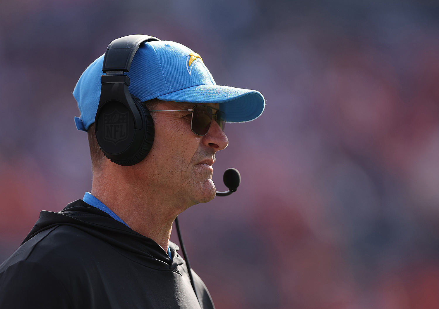 Why Chargers coach Jim Harbaugh briefly left Sunday's game