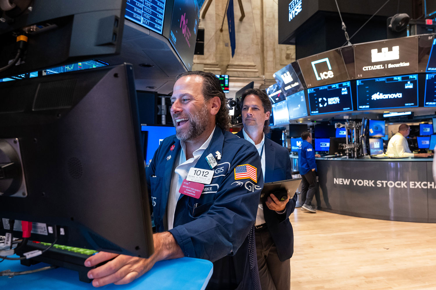 Dow adds 200 points for first close above 43,000